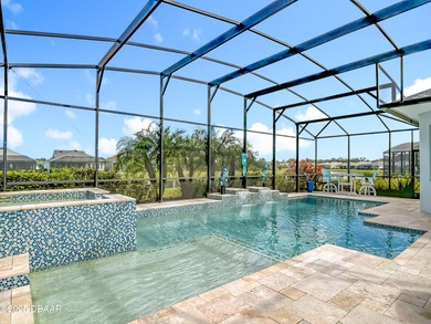 A Masterpiece of indoor-outdoor living in Latitude on LPGA International Golf Course in Florida - for sale on GolfHomes.com, golf home, golf lot