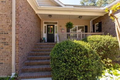 Welcome to this bright, open, and family-friendly brick home on on Beacon Ridge Golf and Country Club in North Carolina - for sale on GolfHomes.com, golf home, golf lot