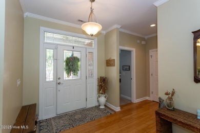 Welcome to this bright, open, and family-friendly brick home on on Beacon Ridge Golf and Country Club in North Carolina - for sale on GolfHomes.com, golf home, golf lot