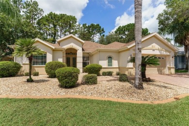 Step into this pristine 2-bedroom, (plus Den/Office/Art on Eagle Ridge At Spruce Creek Country Club in Florida - for sale on GolfHomes.com, golf home, golf lot