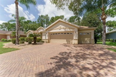 Step into this pristine 2-bedroom, (plus Den/Office/Art on Eagle Ridge At Spruce Creek Country Club in Florida - for sale on GolfHomes.com, golf home, golf lot