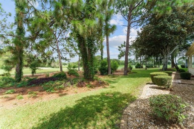Step into this pristine 2-bedroom, (plus Den/Office/Art on Eagle Ridge At Spruce Creek Country Club in Florida - for sale on GolfHomes.com, golf home, golf lot