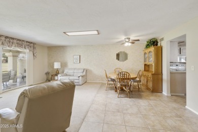 Welcome home to this charming property located in the highly on Fountain of the Sun Country Club in Arizona - for sale on GolfHomes.com, golf home, golf lot