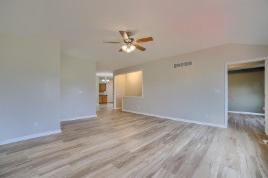Experience a beautiful balance of style and convenience in this on Ellis Country Club in Kansas - for sale on GolfHomes.com, golf home, golf lot