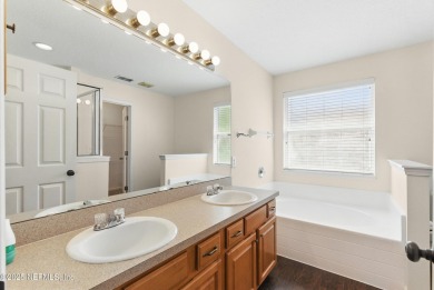 Welcome to this delightful residence nestled in a vibrant part on King and Bear Golf Course/World Golf Village in Florida - for sale on GolfHomes.com, golf home, golf lot