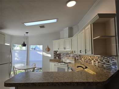 VERY WELL MAINTAINED 2-bedroom 2 bath home in beautiful Zellwood on Zellwood Station Country Club in Florida - for sale on GolfHomes.com, golf home, golf lot