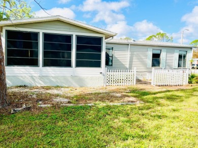 Charming 2-Bed, 2-Bath Home with Water View in Pine Lakes on Pine Lakes Country Club in Florida - for sale on GolfHomes.com, golf home, golf lot