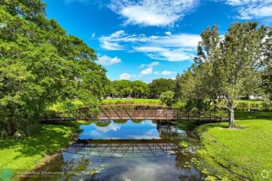 This bright and breezy 2-bed, 2-bath Wingfoot condo in Indian on The Golf Club of Jupiter in Florida - for sale on GolfHomes.com, golf home, golf lot