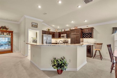 Stunning Expanded Iris Designer Home in the Village of on Egret Championship Golf Course in Florida - for sale on GolfHomes.com, golf home, golf lot