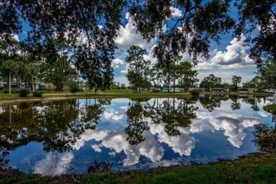 Charming 2-Bed, 2-Bath Home with Water View in Pine Lakes on Pine Lakes Country Club in Florida - for sale on GolfHomes.com, golf home, golf lot