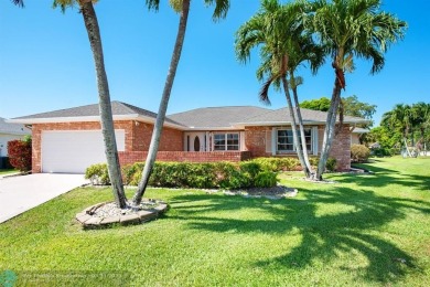 Discover your dream home at 10893 Ventura Cir in a serene on Pine Tree Golf Club in Florida - for sale on GolfHomes.com, golf home, golf lot