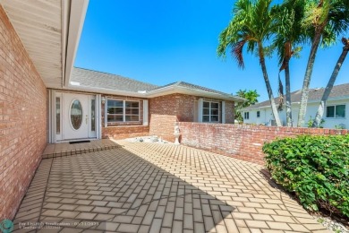 Discover your dream home at 10893 Ventura Cir in a serene on Pine Tree Golf Club in Florida - for sale on GolfHomes.com, golf home, golf lot