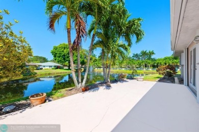 Discover your dream home at 10893 Ventura Cir in a serene on Pine Tree Golf Club in Florida - for sale on GolfHomes.com, golf home, golf lot