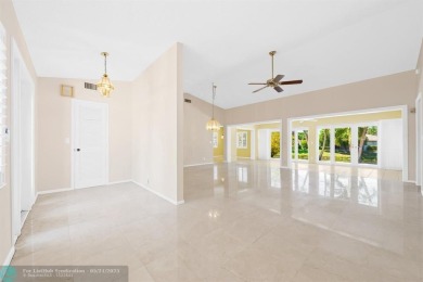 Discover your dream home at 10893 Ventura Cir in a serene on Pine Tree Golf Club in Florida - for sale on GolfHomes.com, golf home, golf lot
