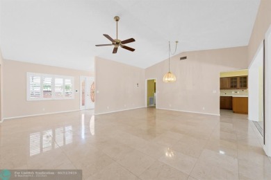 Discover your dream home at 10893 Ventura Cir in a serene on Pine Tree Golf Club in Florida - for sale on GolfHomes.com, golf home, golf lot