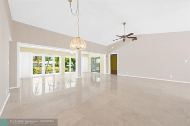 Discover your dream home at 10893 Ventura Cir in a serene on Pine Tree Golf Club in Florida - for sale on GolfHomes.com, golf home, golf lot