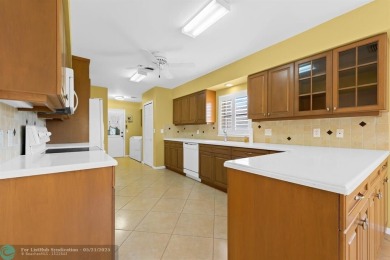 Discover your dream home at 10893 Ventura Cir in a serene on Pine Tree Golf Club in Florida - for sale on GolfHomes.com, golf home, golf lot