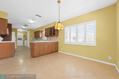 Discover your dream home at 10893 Ventura Cir in a serene on Pine Tree Golf Club in Florida - for sale on GolfHomes.com, golf home, golf lot