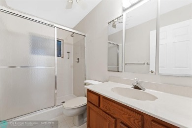 Discover your dream home at 10893 Ventura Cir in a serene on Pine Tree Golf Club in Florida - for sale on GolfHomes.com, golf home, golf lot