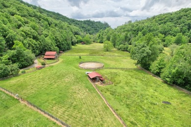 Nestled in the scenic landscape of western NC, this horse farm on Mountain Harbour Golf Club in North Carolina - for sale on GolfHomes.com, golf home, golf lot