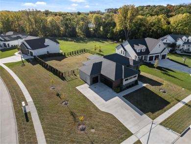 Welcome to this exceptional 5-bedroom, 4-bathroom home nestled on Tournament Club of Iowa in Iowa - for sale on GolfHomes.com, golf home, golf lot