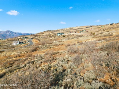 Set on over two spacious acres with a gentle downhill slope on Talisker Club At Tuhaye in Utah - for sale on GolfHomes.com, golf home, golf lot