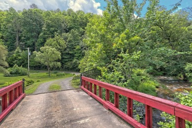 Nestled in the scenic landscape of western NC, this horse farm on Mountain Harbour Golf Club in North Carolina - for sale on GolfHomes.com, golf home, golf lot