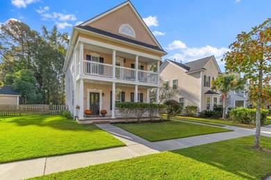 Double front porches set the tone for this thoughtfully updated on Charleston National Golf Club in South Carolina - for sale on GolfHomes.com, golf home, golf lot