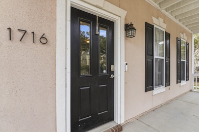 Double front porches set the tone for this thoughtfully updated on Charleston National Golf Club in South Carolina - for sale on GolfHomes.com, golf home, golf lot