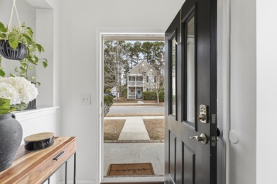 Double front porches set the tone for this thoughtfully updated on Charleston National Golf Club in South Carolina - for sale on GolfHomes.com, golf home, golf lot