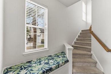 Double front porches set the tone for this thoughtfully updated on Charleston National Golf Club in South Carolina - for sale on GolfHomes.com, golf home, golf lot