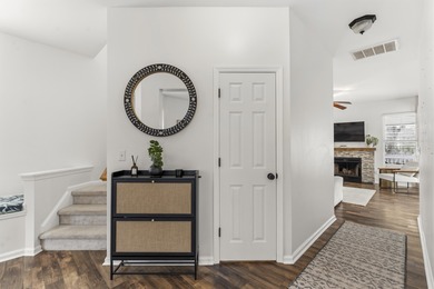 Double front porches set the tone for this thoughtfully updated on Charleston National Golf Club in South Carolina - for sale on GolfHomes.com, golf home, golf lot