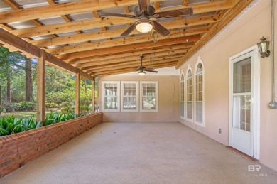 Golf Course Living in Lake Forest! Nestled on a tree-shaded lot on Lake Forest Yacht and Country Club in Alabama - for sale on GolfHomes.com, golf home, golf lot