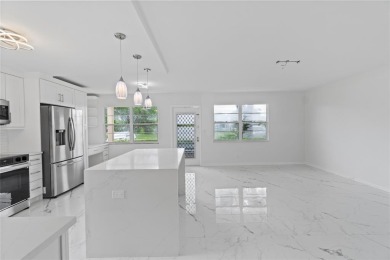 BRAND-NEW IMPACT SLIDING GLASS DOOR INSTALLED, Expanding the on Hillsboro Pines Golf in Florida - for sale on GolfHomes.com, golf home, golf lot