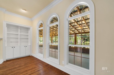 Golf Course Living in Lake Forest! Nestled on a tree-shaded lot on Lake Forest Yacht and Country Club in Alabama - for sale on GolfHomes.com, golf home, golf lot