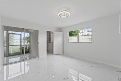 BRAND-NEW IMPACT SLIDING GLASS DOOR INSTALLED, Expanding the on Hillsboro Pines Golf in Florida - for sale on GolfHomes.com, golf home, golf lot