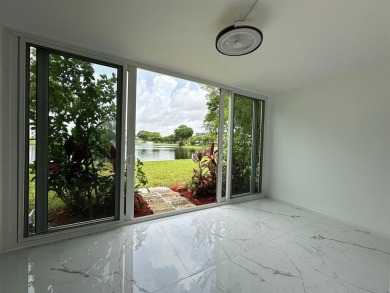 BRAND-NEW IMPACT SLIDING GLASS DOOR INSTALLED, Expanding the on Hillsboro Pines Golf in Florida - for sale on GolfHomes.com, golf home, golf lot