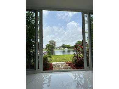 BRAND-NEW IMPACT SLIDING GLASS DOOR INSTALLED, Expanding the on Hillsboro Pines Golf in Florida - for sale on GolfHomes.com, golf home, golf lot