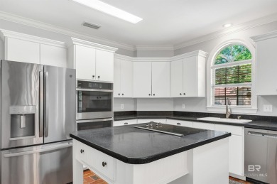 Golf Course Living in Lake Forest! Nestled on a tree-shaded lot on Lake Forest Yacht and Country Club in Alabama - for sale on GolfHomes.com, golf home, golf lot