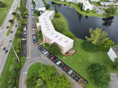 BRAND-NEW IMPACT SLIDING GLASS DOOR INSTALLED, Expanding the on Hillsboro Pines Golf in Florida - for sale on GolfHomes.com, golf home, golf lot