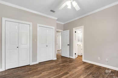 Golf Course Living in Lake Forest! Nestled on a tree-shaded lot on Lake Forest Yacht and Country Club in Alabama - for sale on GolfHomes.com, golf home, golf lot
