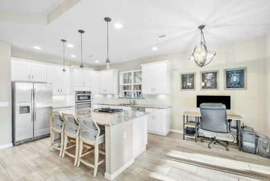 Welcome to an exquisite ground-floor residence in the on Jupiter Country Club in Florida - for sale on GolfHomes.com, golf home, golf lot
