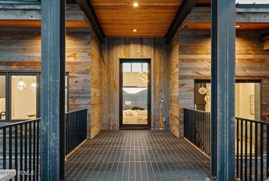 Perched on a private, sweeping 180-degree view lot on the on Red Ledges Golf Club in Utah - for sale on GolfHomes.com, golf home, golf lot