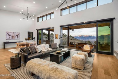 Perched on a private, sweeping 180-degree view lot on the on Red Ledges Golf Club in Utah - for sale on GolfHomes.com, golf home, golf lot