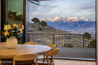 Perched on a private, sweeping 180-degree view lot on the on Red Ledges Golf Club in Utah - for sale on GolfHomes.com, golf home, golf lot