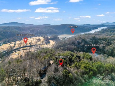 180-degree year-round panoramic mountain views from this on Rumbling Bald Resort on Lake Lure in North Carolina - for sale on GolfHomes.com, golf home, golf lot