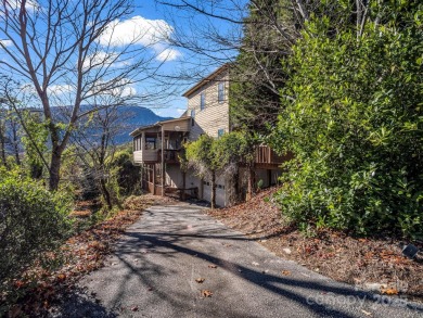 180-degree year-round panoramic mountain views from this on Rumbling Bald Resort on Lake Lure in North Carolina - for sale on GolfHomes.com, golf home, golf lot