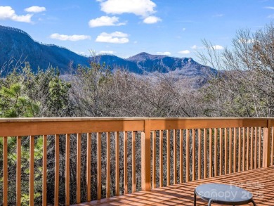 180-degree year-round panoramic mountain views from this on Rumbling Bald Resort on Lake Lure in North Carolina - for sale on GolfHomes.com, golf home, golf lot