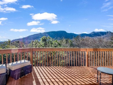 180-degree year-round panoramic mountain views from this on Rumbling Bald Resort on Lake Lure in North Carolina - for sale on GolfHomes.com, golf home, golf lot