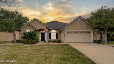 Welcome to your dream home in Fleming Island Plantation! Nestled on Golf Club At Fleming Island in Florida - for sale on GolfHomes.com, golf home, golf lot